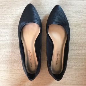 Pointed toe black leather flats